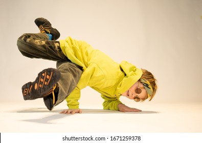 Little Boy In A Difficult Break Dance Position