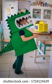 Little Boy In Dinosaur Costume