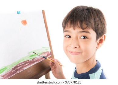 Little boy drawing and painting picture art  in the paper - Powered by Shutterstock