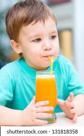 Little Boy Drinking Orange Juice Using Stock Photo 131818358 | Shutterstock
