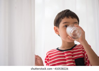 Little Boy Drinking Water