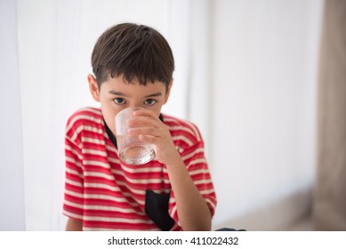 Little Boy Drinking Water