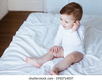 Little Boy With Ear Pain Moaning Holding Hand On Ear At Home, Child Headache Pain, Health Care Concept, Ear Protection , Teeth Pain Side View