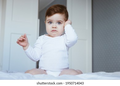 Little Boy With Ear Pain Moaning Holding Hand On Ear At Home, Child Headache Pain, Health Care Concept, Ear Protection , Teeth Pain , Baby Side View