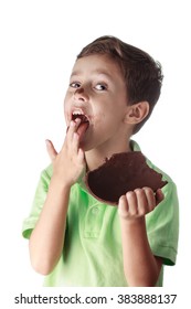 Little Boy Eating Chocolate Easter Egg On White Background