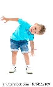 Little Boy Emotionally Waving His Hands In The Studio On A White Background. The Concept Of A Happy Childhood, Family And People. Isolated.