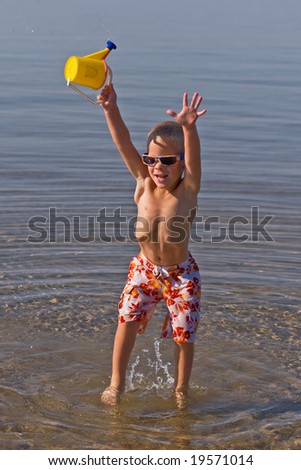 Similar – Foto Bild Kind spielt mit Sand auf den Dünen