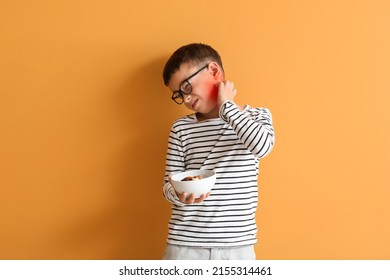 Little Boy With Food Allergy On Orange Background