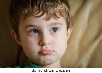 Little Boy Looking Sideways Stock Photo (Edit Now) 3846853