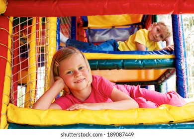 little boy and girl playing in the game maze - Shutterstock ID 189087449
