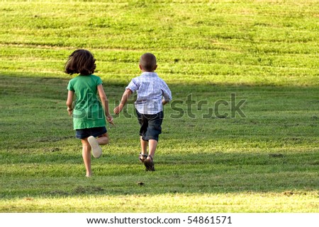 Similar – Image, Stock Photo Two teenagers race through the sunshine on a sled, dusted with snow