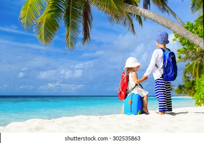 Little Boy And Girl Travel On Summer Tropical Beach, Family Vacation