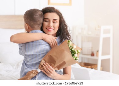 Little Boy Greeting His Mom On Mother's Day At Home