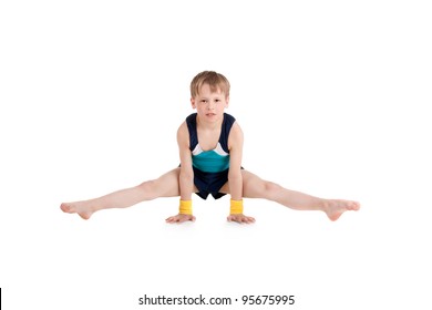little boy gymnast doing exercises