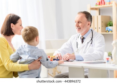 Little boy with his mother at paediatrician on consultation
