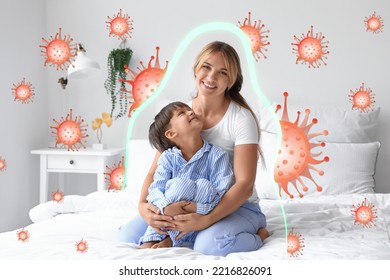Little boy with his mother sitting on bed. Concept of strong immunity - Shutterstock ID 2216826091