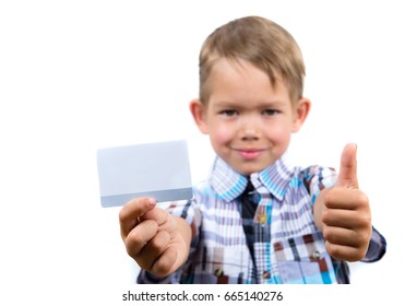 Little Boy Holding Credit Card Over White Background