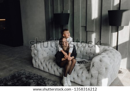 Similar – Foto Bild Kaukasische Mutter und Kleinkind Sohn auf der Couch sitzend mit Tablette