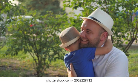 A Little Boy Hugs His Beloved Father, Dad Is In The Arms Of His Son, Happy Family Life, Father's Day, Raising A Kid In Family, Child Life With An Older Parent, Raising Baby As Man, Cheerful Childhood