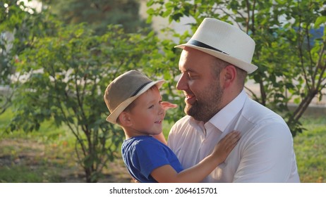 A Little Boy Hugs His Beloved Father, Dad Is In The Arms Of His Son, Happy Family Life, Father's Day, Raising A Kid In Family, Child Life With An Older Parent, Raising Baby As Man, Cheerful Childhood