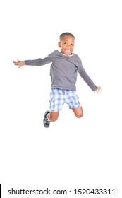 Little Boy Jumping Isolated In White