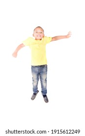 little boy jumping isolated in white