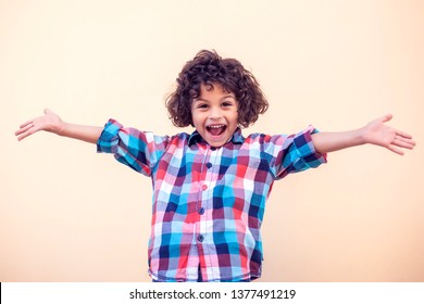 Little Boy Kid Shows Hugs With Open Arms