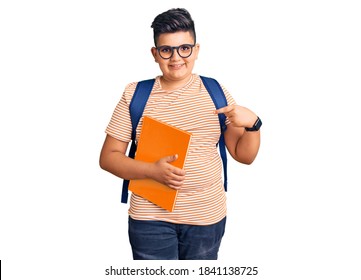 Little Boy Kid Wearing Student Backpack Holding Books Pointing Finger To One Self Smiling Happy And Proud 