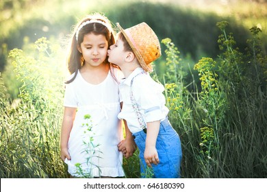 Little Boy Kissing Girl