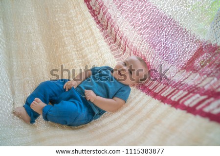 Image, Stock Photo The little boy are laying at the hammock and happy