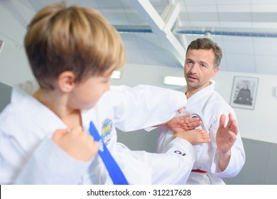 Little boy learning a martial art - Powered by Shutterstock