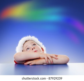 Little Boy Looking Up To Copy Space, Rainbow On Night Sky