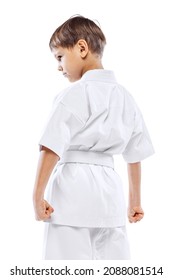Little boy martial art sportsman posing isolated over white background. Concept of martial art, healthy lifestyle, sport, action, combat sport, energy, fit. Copy space for ad