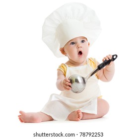 Little boy with metal ladle and cook hat isolated