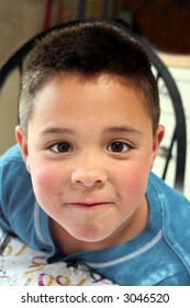 Little Boy Mugging for Camera