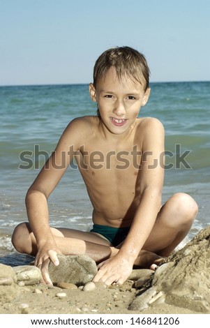 Similar – Image, Stock Photo Little boy doing exercise at beach