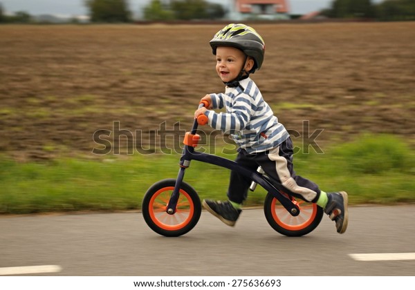 little boy on bike