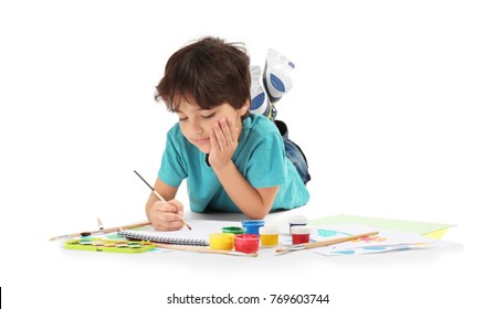 Little Boy Painting Against White Background