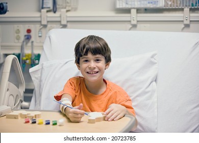 Little Boy Painting in the Hospital - Powered by Shutterstock