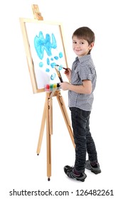 Little Boy Painting Paints Picture On Easel Isolated On White