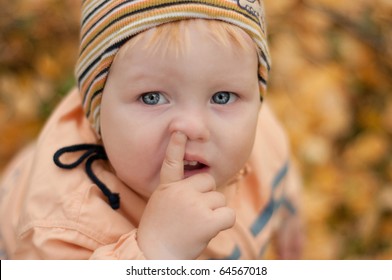 Little Boy Picking His Nose