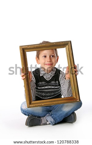 Little boy with picture frame