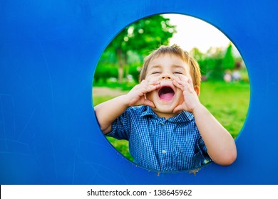 Little Boy In Playhouse