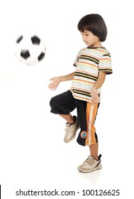 Little Boy Playing Football Isolated On White Background