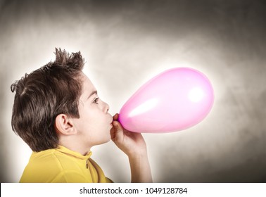 Little Boy Playing Inflating Balloon Stock Photo 1049128784 | Shutterstock