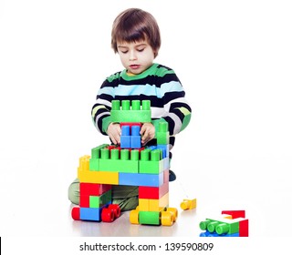 Little Boy Playing Lego