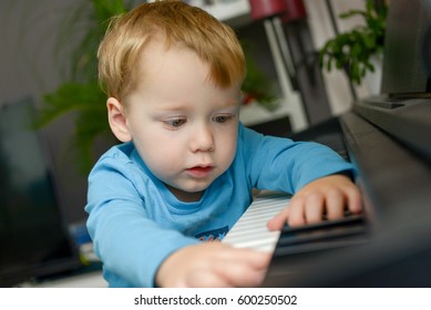 Little Boy Playing Piano