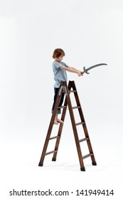 Little Boy Playing Pirates With Toy Sword And Ladder