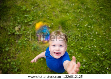 Similar – Happy little girl playing in a urban playground.