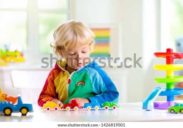 Little Boy Playing Toy Cars Young Stock Photo Edit Now 1426819001